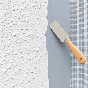 Jak zakryć tynk mozaikowy